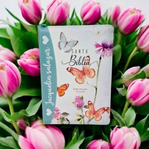 Biblia turquesa con mariposas