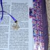 BIBLIA MORADA FLORAL CON MARIPOSA LETRA 14 PUNTOS RV1960